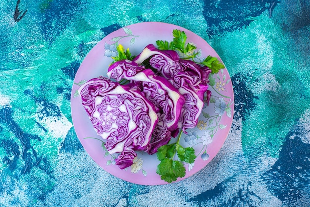 Free Photo red cabbage and parsley on a plate 