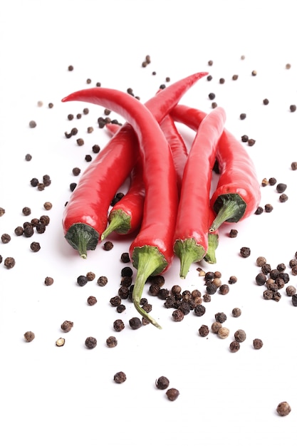 Free Photo red chili peppers and peppercornss and peppercorns