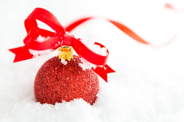 Red christmas balls with snow