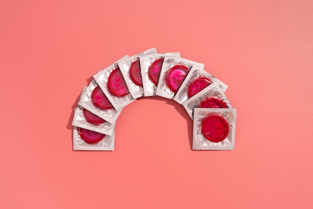 Free photo red condoms arrangement top view