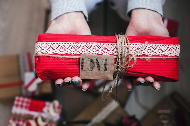 Free Photo red fabric with a tie that "love"