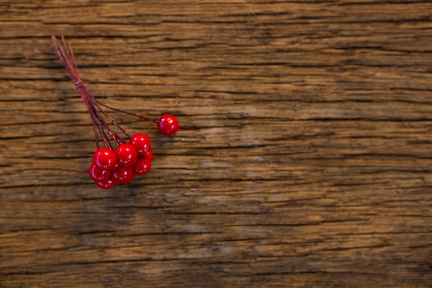 Red fruits on a wooden table