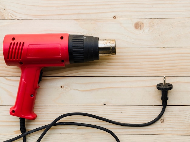 Free photo red gas burner on wooden table