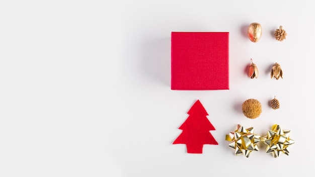 Free Photo red gift box near different decorations