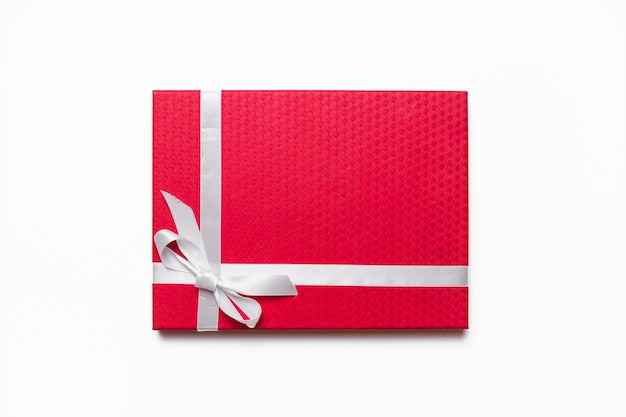 Free Photo red gift box on table 