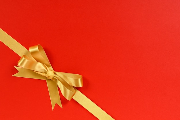 Red gift with golden ribbon