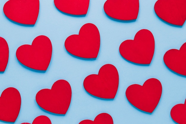 Free photo red hearts on blue background