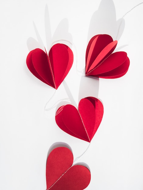 Red paper hearts on table