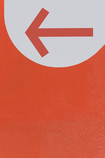 Free photo red pointy arrow and copy space