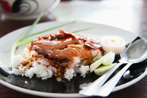 Free Photo red pork and rice - famous thai food recipe