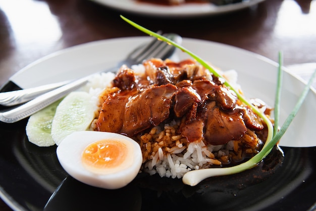 Red pork and rice - famous Thai food recipe