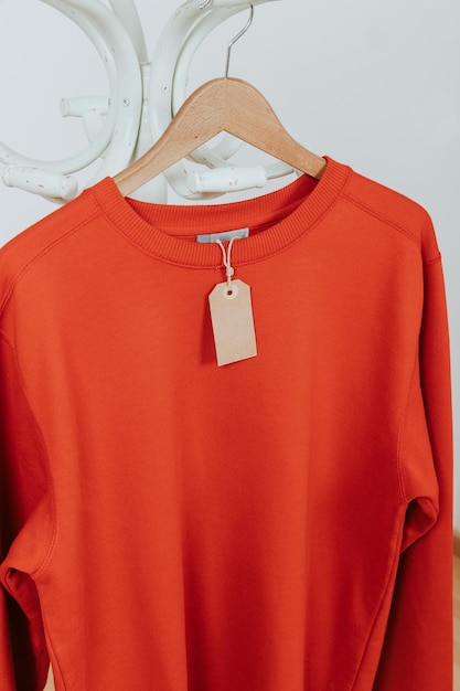 Free Photo red pullover with tag