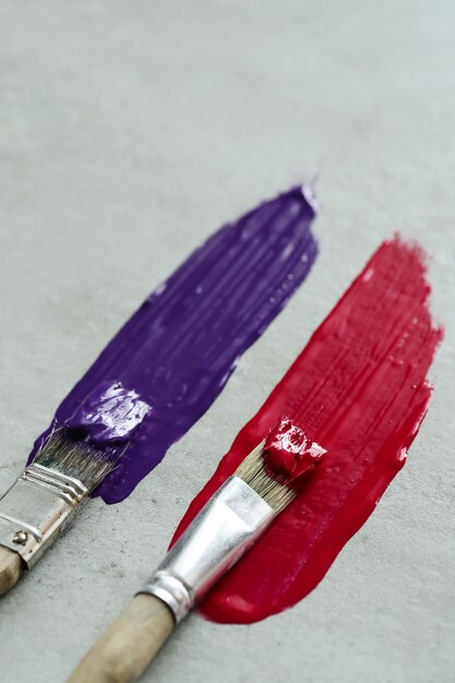 red and purple brush strokes