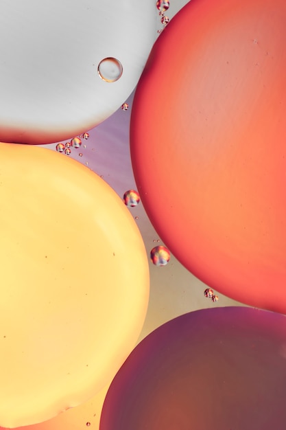 Free photo red purple and yellow abstract background with bubbles