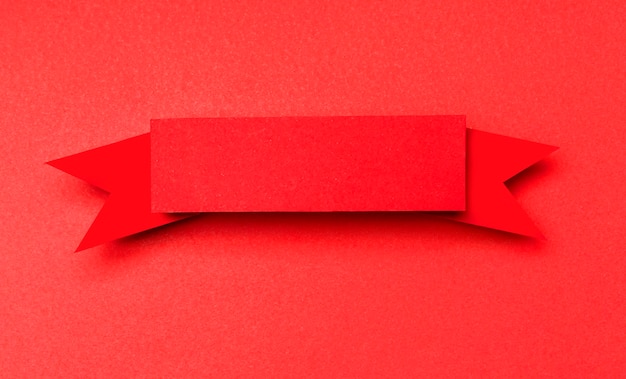 Free photo red ribbon on red background