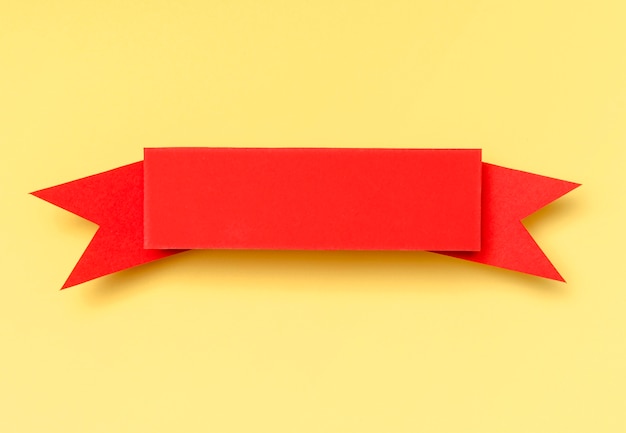 Red ribbon on yellow background