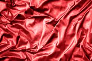 Free photo red shiny silk fabric texture