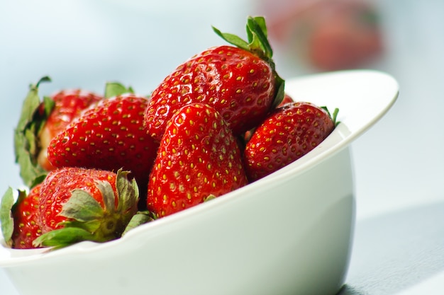 Red strawberry on a dish