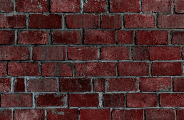 Free photo red textured brick wall background