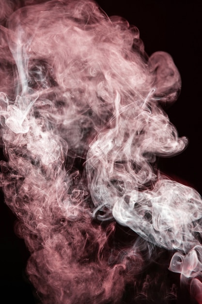 Free Photo red wavy smoke on black background