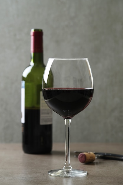 Red wine in glass and bottle