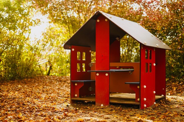 Red wooden playground in the park