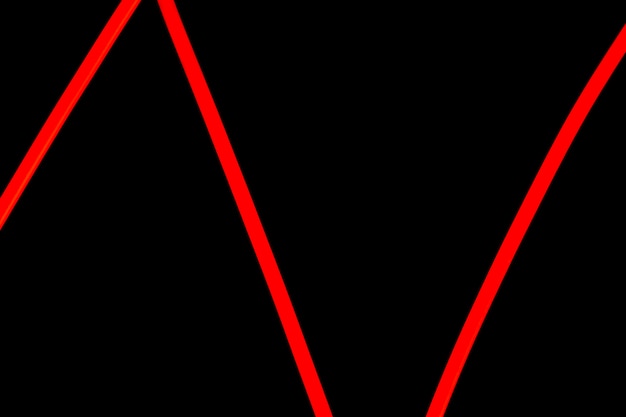 Red zig zag neon light on black background