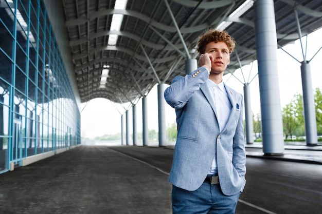 redhaired businessman talking on phone