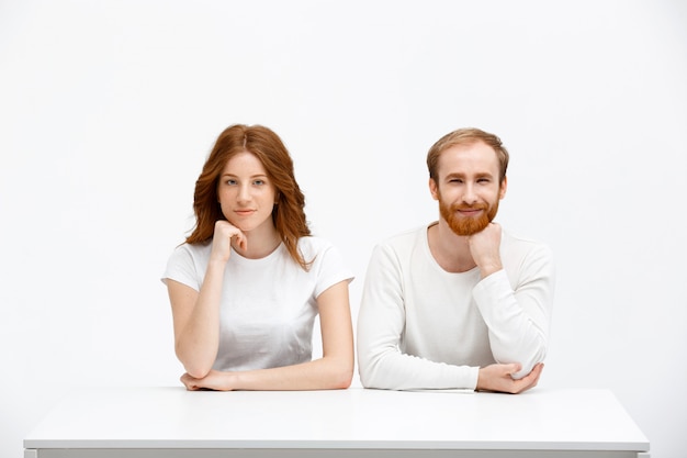 Free photo redhead man and woman look curious