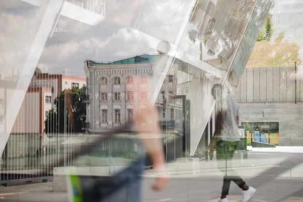 Free Photo reflection of walking people