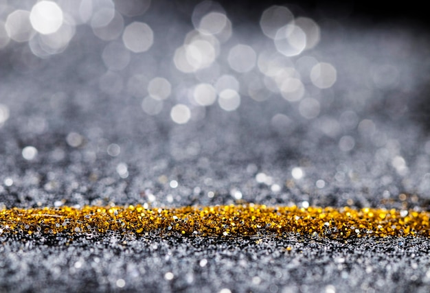 Free Photo reflective gold and gray glitter