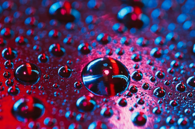 Free photo refreshing red and blue water bubble background