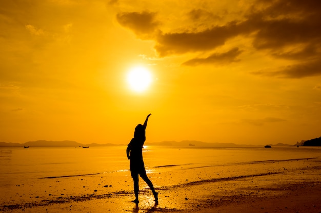 Relax Woman  jumping sea on the beach   