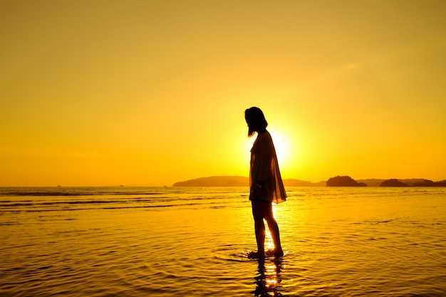 Relax Woman  standing sea on the beach   