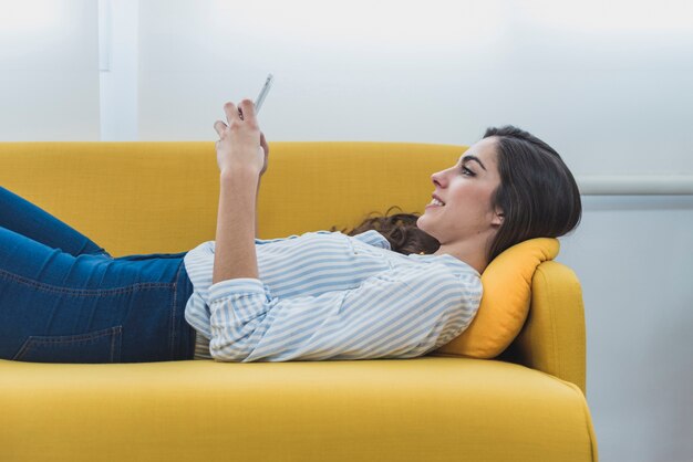 Relaxed employee lying on the couch