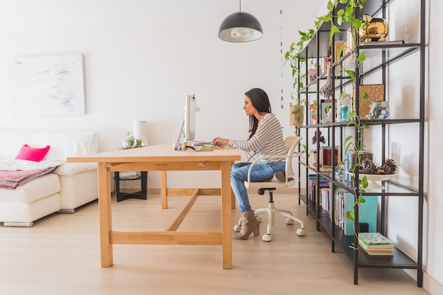 Relaxed employee working in the office