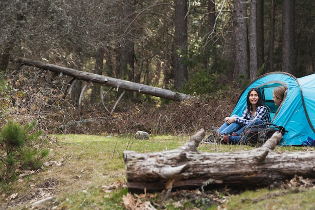 Free Photo relaxed women camping in the forest