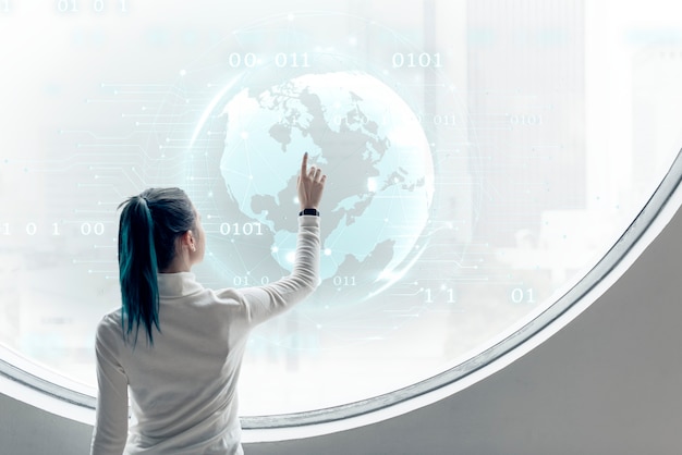 Free photo researcher spinning a globe on a round screen