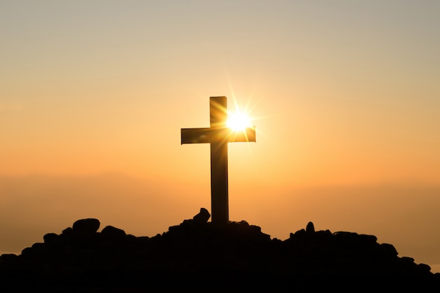 Free photo resurrection concept: crucifixion of jesus christ cross at sunset