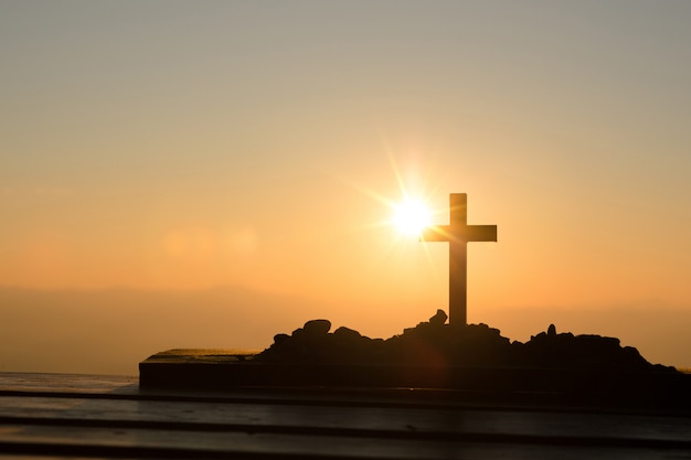 Free photo resurrection concept: crucifixion of jesus christ cross at sunset