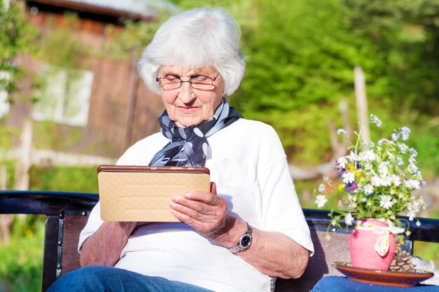 Retired woman holding her purse