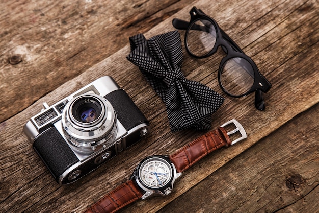 Retro camera, watch, bowtie and glasses