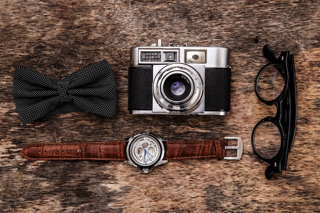 Retro camera, watch, bowtie and glasses