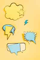 Free photo retro collection of comic speech bubbles on yellow backdrop