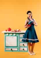 Free photo retro pinup girl in the kitchen