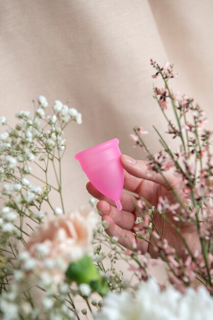 Reusable menstrual cup product with flowers