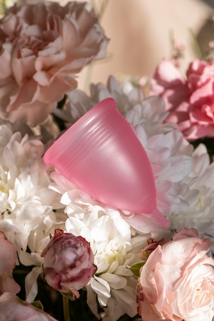 Reusable menstrual cup product with flowers