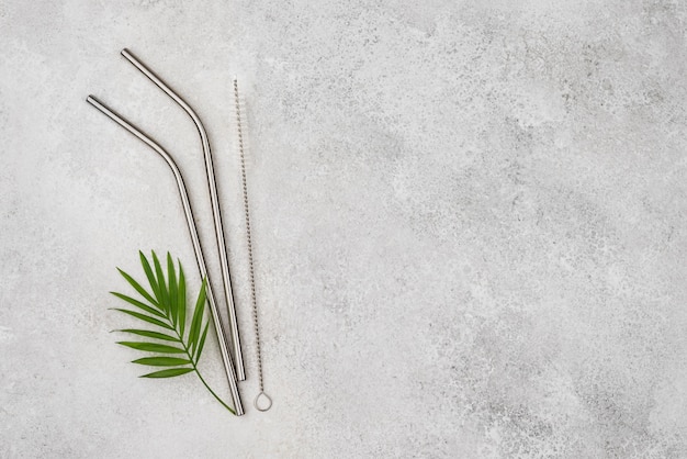 Free photo reusable metal silver straws copy space