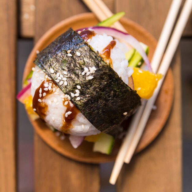 Rice ball with nori and vegetables