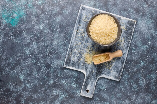 Rice flakes, rice noodles, rice bread and rice, top view